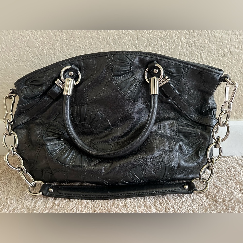 Black leather coach purse with logo